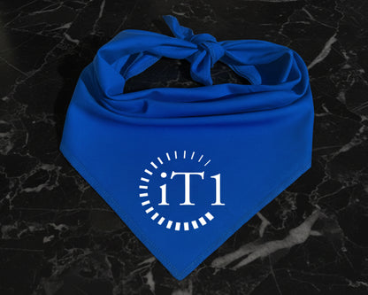 A vibrant blue cotton pet bandana featuring a crisp white heat-pressed vinyl "iT1" corporate logo.