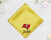 A radiant gold high-lustre satin handkerchief personalized with the name "Jacob" below a high-definition vinyl Tampa Bay Buccaneers team icon.