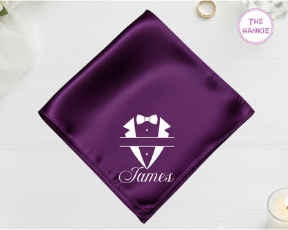A royal plum luxury satin handkerchief customized with the name "James" integrated into a white vinyl split-style formal suit design.