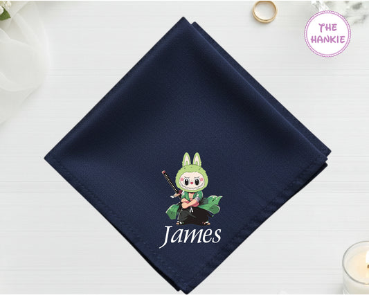 A midnight navy cotton handkerchief featuring a high-density machine-embroidered Samurai Labubu icon and the name "James".