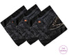 Set of three black hankies with dragon design on a white background