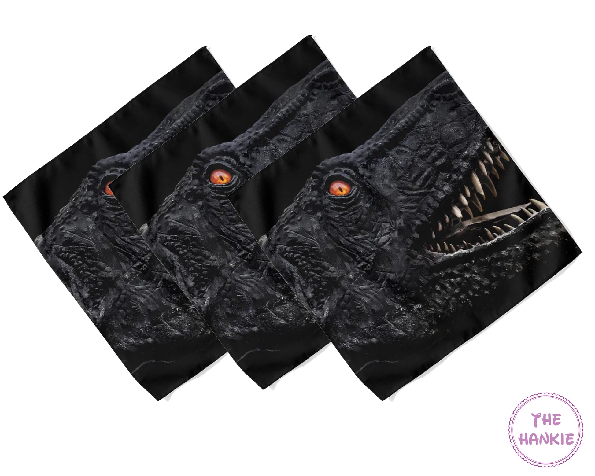 Set of three black hankies with dragon design on a white background