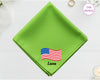 A spring green cotton handkerchief customized with the name "Luna" and a vibrant, waving American flag embroidery.