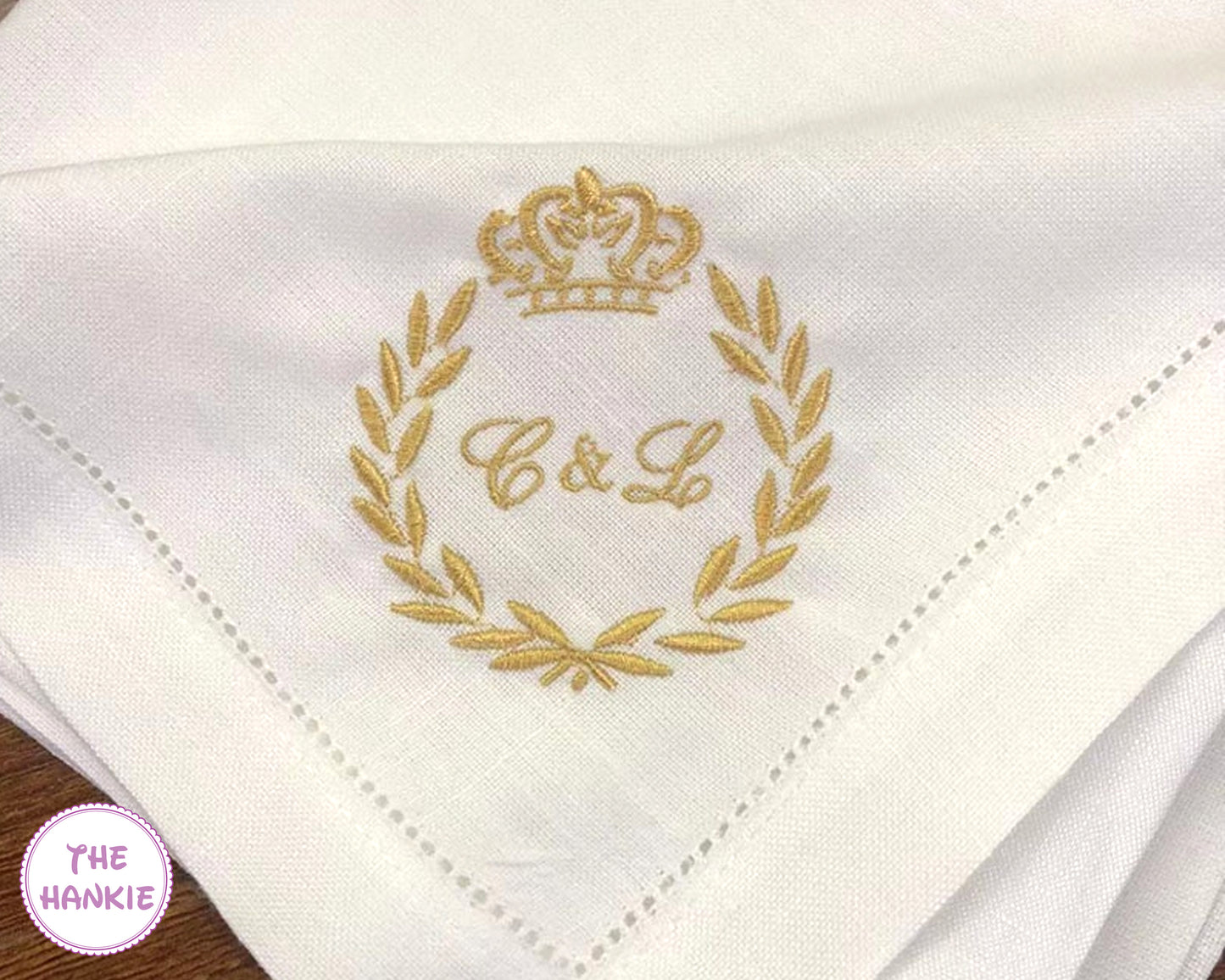 Luxury white handkerchief with gold embroidered crown, laurel wreath, and monogram initials
