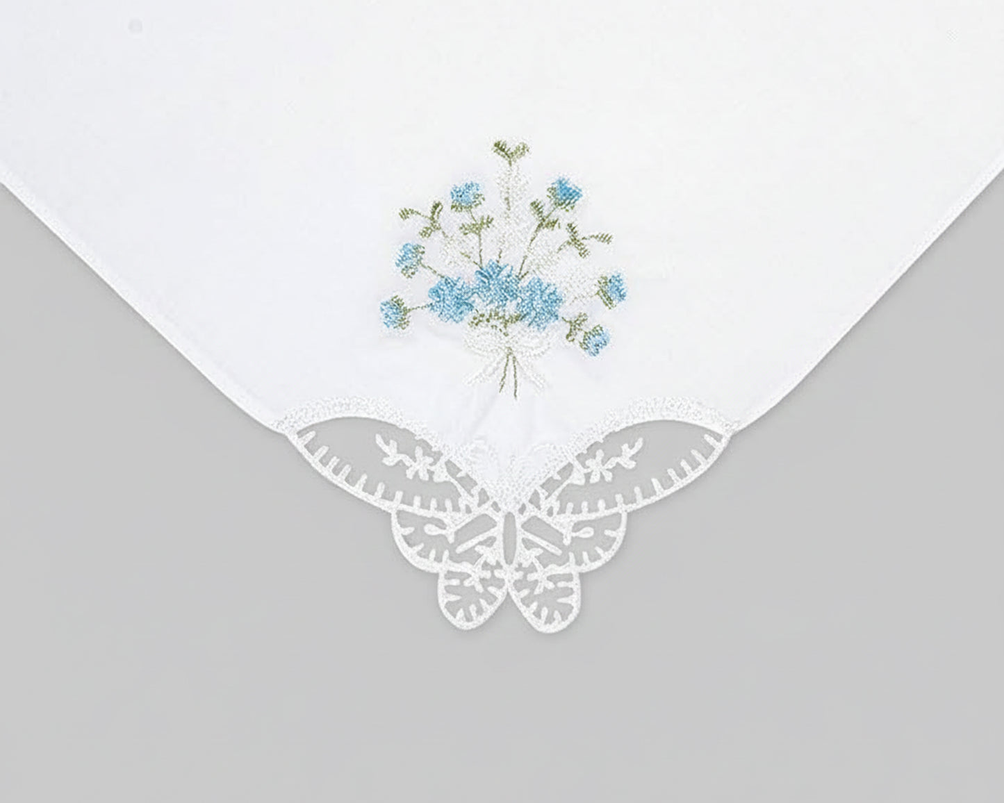 White cotton dinner napkin with detailed pheasant embroidery and hemstitch border