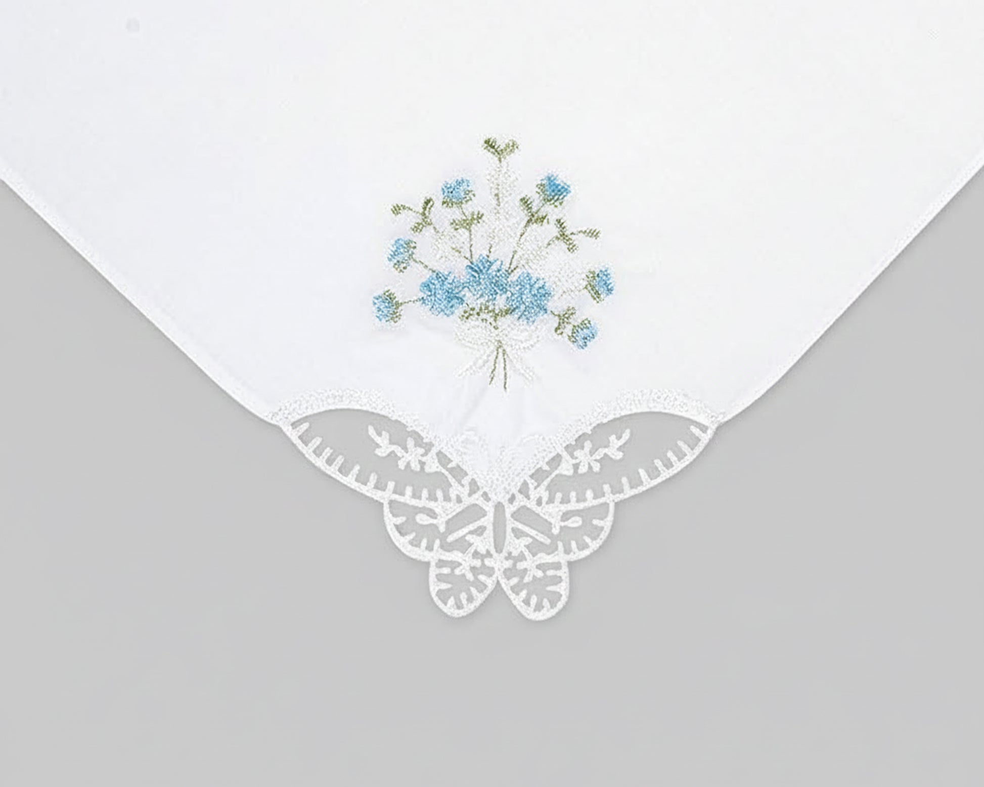 White cotton dinner napkin with detailed pheasant embroidery and hemstitch border