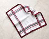 Plaid patterned fabric on a textured surface