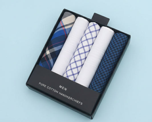 A black presentation box containing five rolled men's pure cotton handkerchiefs in assorted blue and white patterns.
