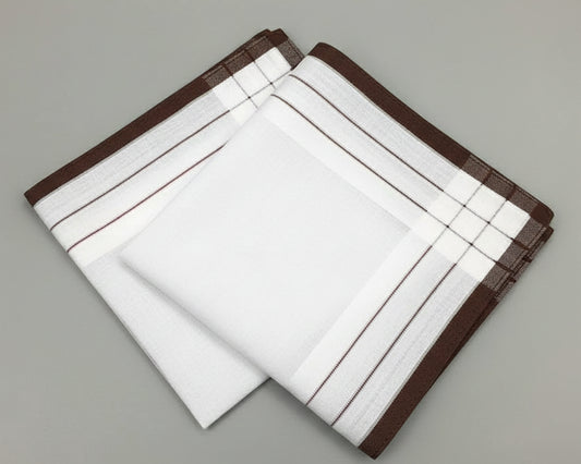 Three white cotton handkerchiefs featuring professional mahogany, navy, and brown woven striped borders displayed together.