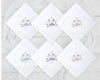 White cocktail napkin with navy blue border and custom duogram