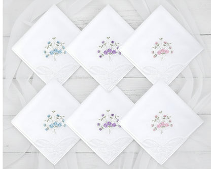 White cocktail napkin with navy blue border and custom duogram