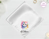 A shimmering pearl white satin handkerchief featuring the name "Oliver" below a soft-focus artistic kitten portrait in pastel tones.