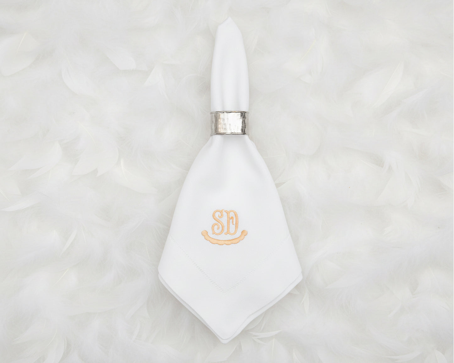 Personalized cotton napkin with gold embroidered SD monogram for elegant table setting