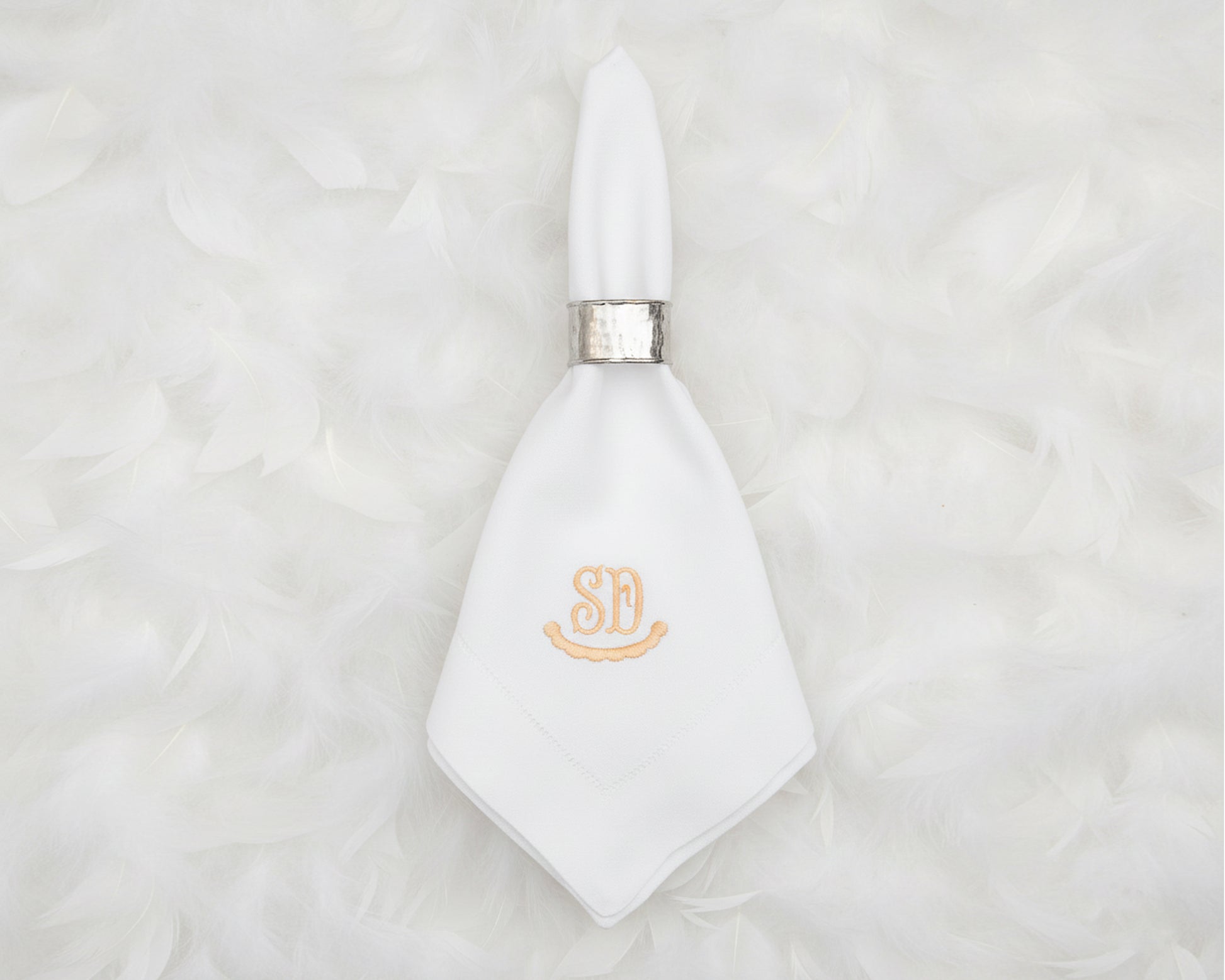 Personalized cotton napkin with gold embroidered SD monogram for elegant table setting