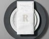 Personalized embroidered cotton napkin featuring classic R monogram for wedding table décor