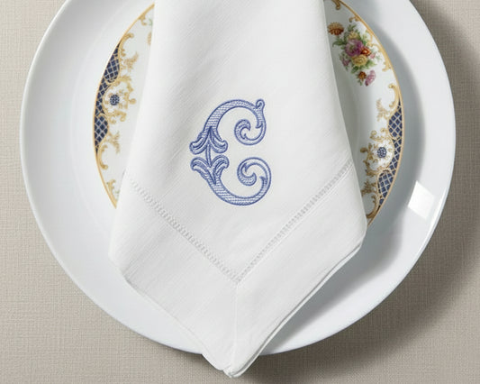 Personalized embroidered cotton napkin with letter C monogram for wedding table setting