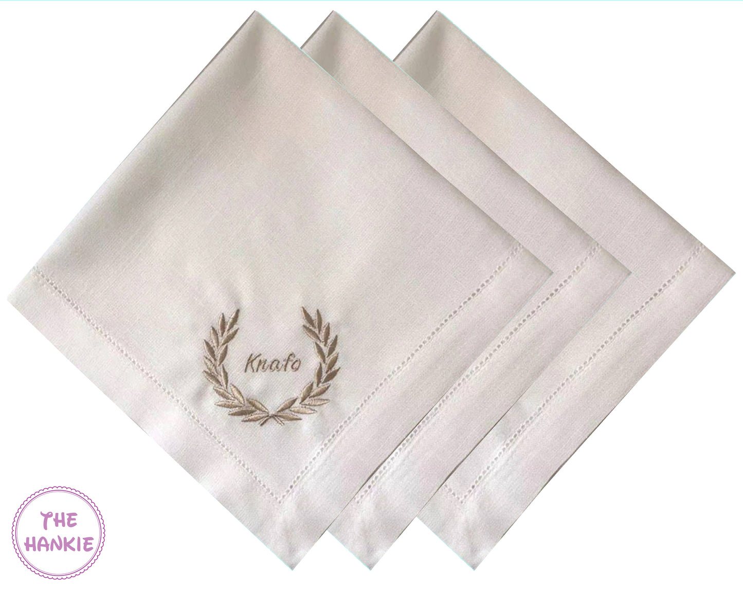 Set of three white personalized handkerchiefs with embroidered laurel wreath and name