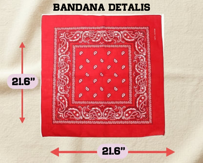 A red paisley bandana displayed with graphic arrows indicating standard dimensions of 21.6 inches by 21.6 inches.