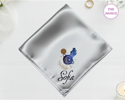 A shimmering silver luxury satin handkerchief personalized with the name "Sofia" below a high-definition blue and gold vinyl Aquarius zodiac icon.