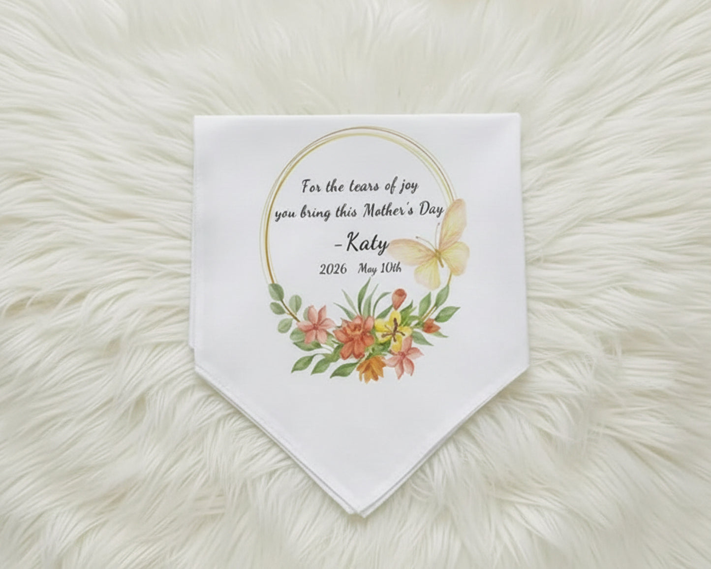 White bridal handkerchief with blue floral embroidery and a vintage-style lace border