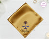 A radiant gold high-lustre satin pocket square customized with the name "Sophia" below a high-definition blue and gold vinyl Libra zodiac icon