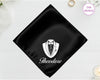 A midnight onyx black luxury satin handkerchief personalized with the name "Theodore" below a white vinyl print of a formal tuxedo shield icon.