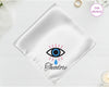 A shimmering pearl white luxury satin handkerchief personalized with "Theodore" below a high-definition vinyl print of a weeping blue evil eye with pink lashes.