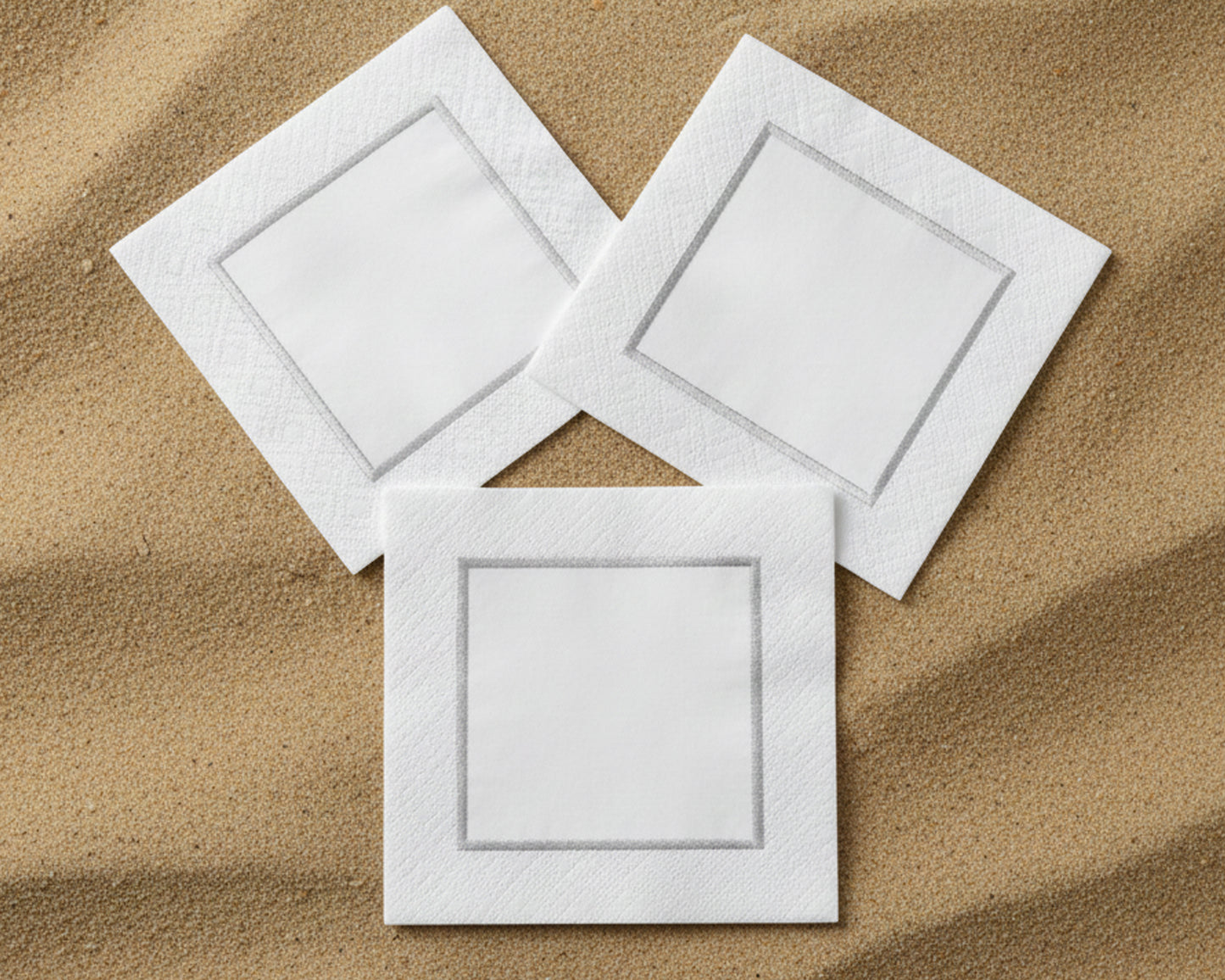 White cotton handkerchief with vibrant colorful floral embroidery and a delicate scalloped lace border